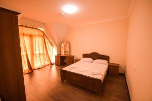Letto o letti in una camera di Hotel Otsneba