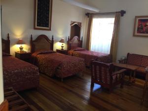 Postel nebo postele na pokoji v ubytování Hotel Midori