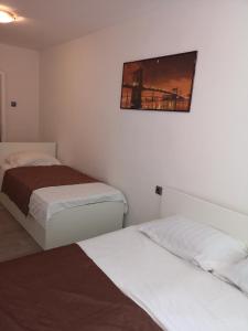 Posteľ alebo postele v izbe v ubytovaní APARTMENT SUNNY PARADISE, Center of Split