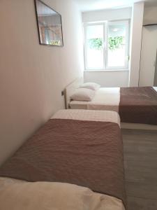 Posteľ alebo postele v izbe v ubytovaní APARTMENT SUNNY PARADISE, Center of Split