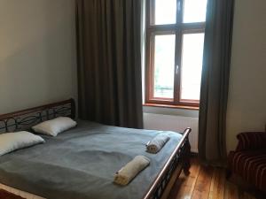 Posteľ alebo postele v izbe v ubytovaní Stylowa Kamienica w Centrum