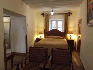 Postel nebo postele na pokoji v ubytování Hotel Midori