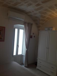 A bed or beds in a room at Il Rifugio Sul Mare