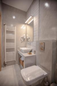 Ванная комната в Oikia guesthouse