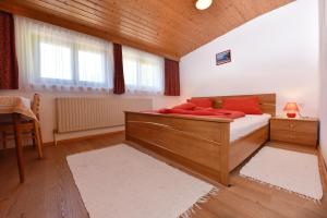 Postel nebo postele na pokoji v ubytování Landhaus Juritsch