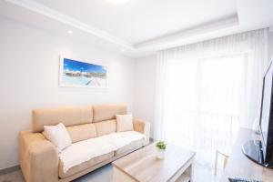 A seating area at Cubo's Apartamento Tivoli B3