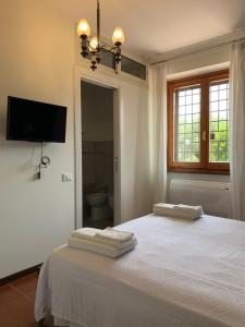 Posteľ alebo postele v izbe v ubytovaní B&b Villa Sofia