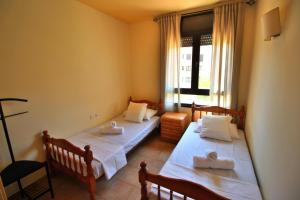 Posteľ alebo postele v izbe v ubytovaní AL07 Apartamento a 300 metros de la playa de Fenals