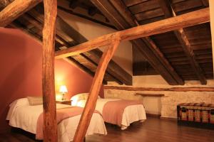 Posteľ alebo postele v izbe v ubytovaní Casa Rural Los Yeros Aldeasoña - Segovia