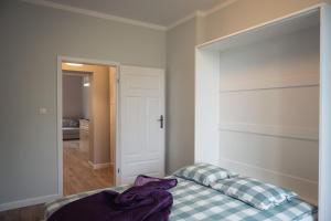 Łóżko lub łóżka w pokoju w obiekcie Apartament Terra Pia