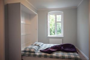 Łóżko lub łóżka w pokoju w obiekcie Apartament Terra Pia