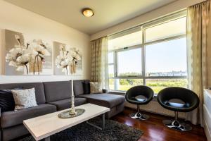 Posezení v ubytování River Apartments