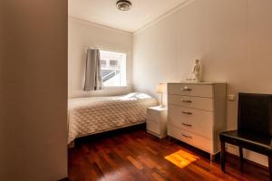 Postel nebo postele na pokoji v ubytování River Apartments