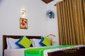 Letto o letti in una camera di VISU VILLA hotel
