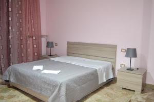 Postel nebo postele na pokoji v ubytování Clotilde