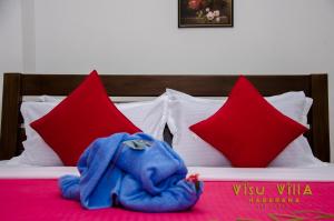 Letto o letti in una camera di VISU VILLA hotel