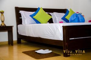 Letto o letti in una camera di VISU VILLA hotel