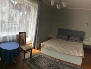 Postel nebo postele na pokoji v ubytování Pokoje gościnne Rubinowa