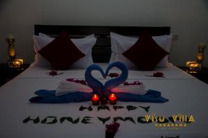 Letto o letti in una camera di VISU VILLA hotel