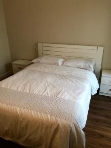 Postel nebo postele na pokoji v ubytování Lugo 360