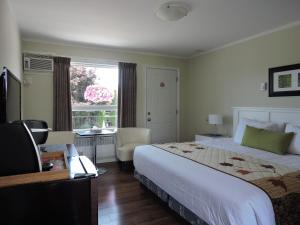 Postel nebo postele na pokoji v ubytování Almo Court Motel