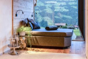 Istumisnurk majutusasutuses "Chalet Bergzeit" Ferienhaus mit Sauna & Wellness