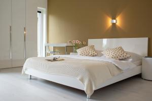 Un pat sau paturi într-o cameră la Modrý Dom