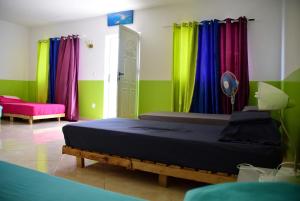 Letto o letti in una camera di Meeting Point- Tarrafal Center, also in Praia & Fogo-NO CASH ACCEPTED