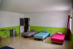 Letto o letti in una camera di Meeting Point- Tarrafal Center, also in Praia & Fogo-NO CASH ACCEPTED