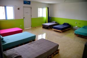 Letto o letti in una camera di Meeting Point- Tarrafal Center, also in Praia & Fogo-NO CASH ACCEPTED