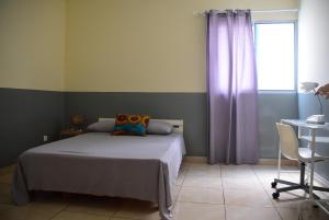 Letto o letti in una camera di Meeting Point- Tarrafal Center, also in Praia & Fogo-NO CASH ACCEPTED