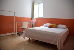 Letto o letti in una camera di Meeting Point- Tarrafal Center, also in Praia & Fogo-NO CASH ACCEPTED