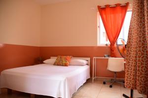 Letto o letti in una camera di Meeting Point- Tarrafal Center, also in Praia & Fogo-NO CASH ACCEPTED