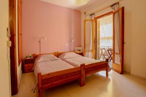 Postel nebo postele na pokoji v ubytování Kallisto Central Apartment