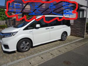 a white van parked in front of a building at Guesthouse Gifu SUAI in Gifu