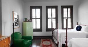 Postel nebo postele na pokoji v ubytování Hotel Havana