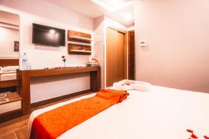 Ένα ή περισσότερα κρεβάτια σε δωμάτιο στο HOTEL MAKARIM TETOUAN