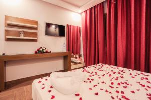 Ένα ή περισσότερα κρεβάτια σε δωμάτιο στο HOTEL MAKARIM TETOUAN