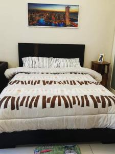 Postel nebo postele na pokoji v ubytování PICO DE LORO RESORT CONDOTEL