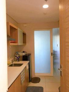 Kuchyň nebo kuchyňský kout v ubytování PICO DE LORO RESORT CONDOTEL