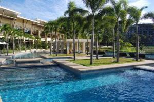 Bazén v ubytování PICO DE LORO RESORT CONDOTEL nebo v jeho okolí