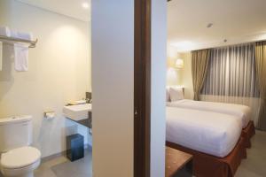 Koupelna v ubytování Savvoya Hotel Seminyak