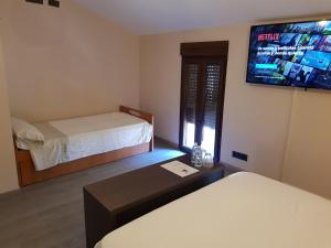 Postel nebo postele na pokoji v ubytování Casa Carol