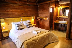 Ένα ή περισσότερα κρεβάτια σε δωμάτιο στο Pousada Morada da Serra