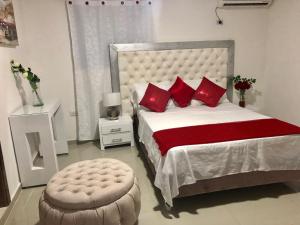 Ein Bett oder Betten in einem Zimmer der Unterkunft Hotel Platinum Barranquilla