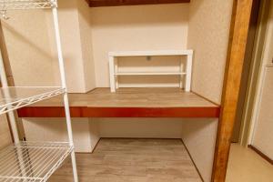 a small room with two bunk beds in it at Chiba Breen hills Inage #8Mx in Chiba