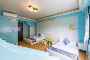Postel nebo postele na pokoji v ubytování Dan Dan Bed and breakfast + 37 fotografií