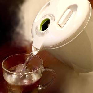 a coffee maker pouring coffee into a cup at Hills Hotel Gotanda in Tokyo