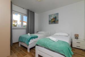 Postel nebo postele na pokoji v ubytování Holiday home MB