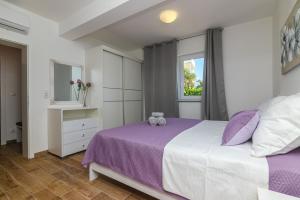 Postel nebo postele na pokoji v ubytování Holiday home MB + 37 fotografií